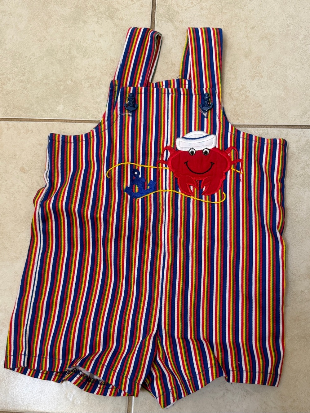 Bbs brand shortalls featuring a striped design and a crab applique